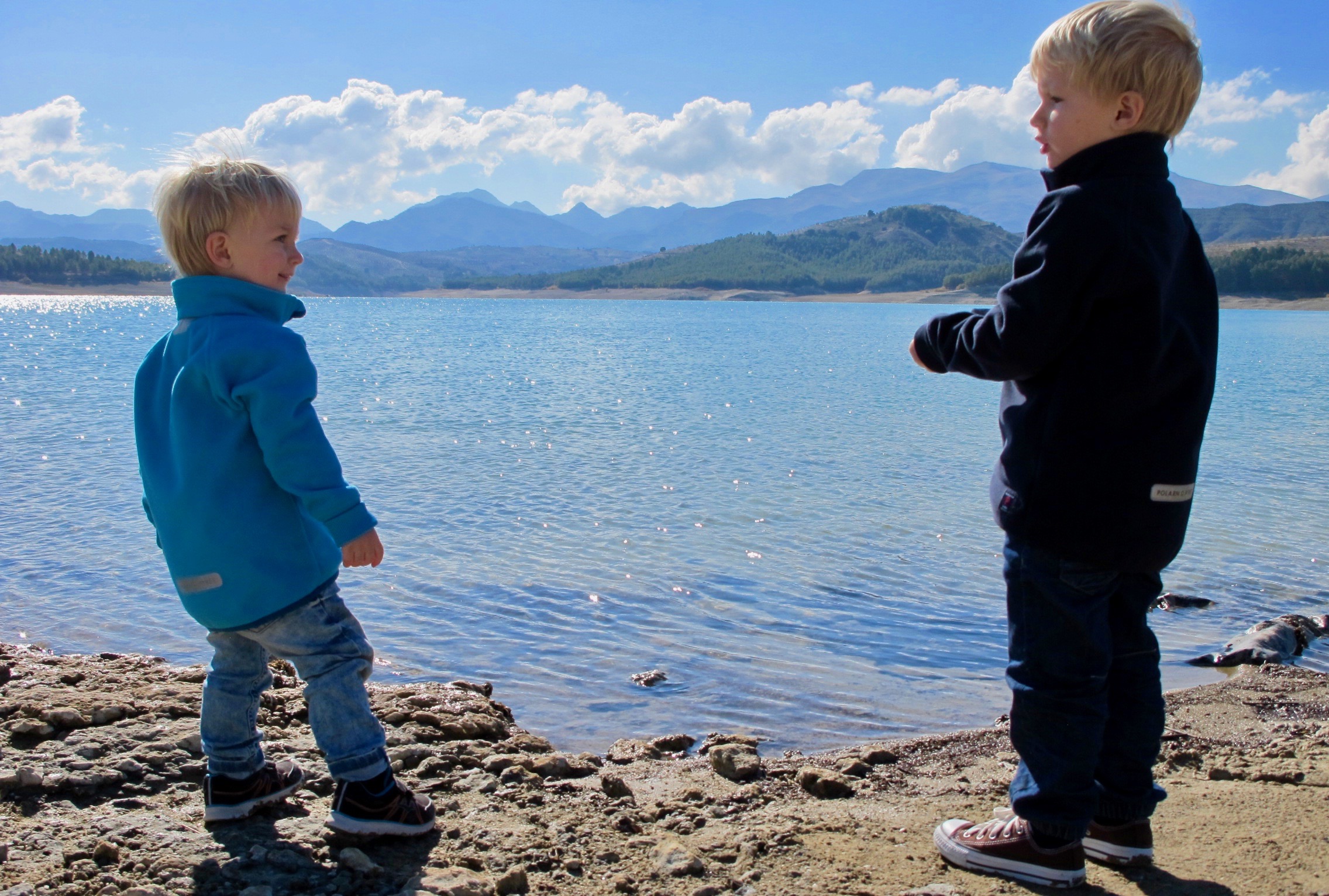 The children play beside the lake Los Bermejales